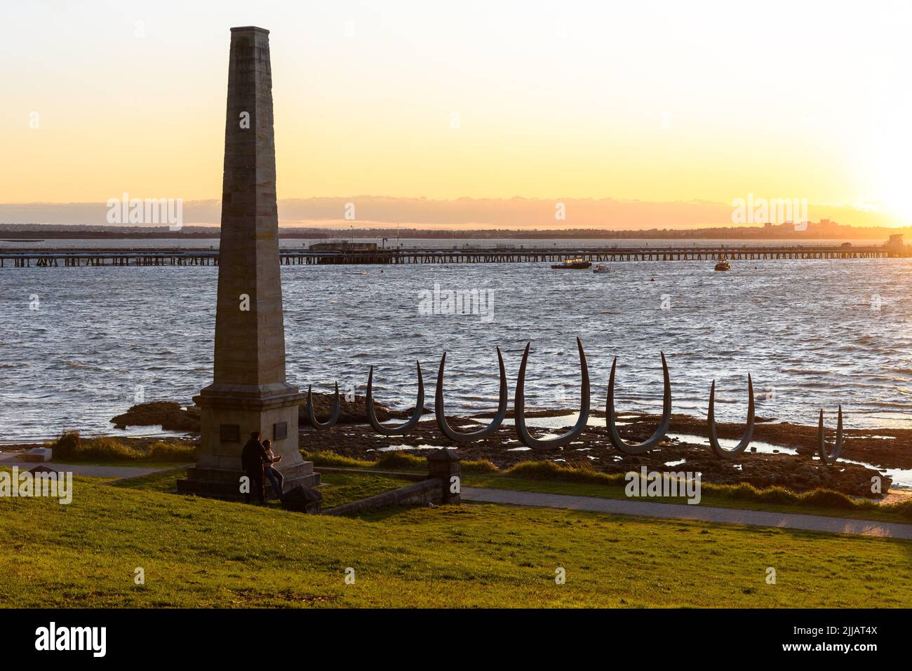 The obelisk marking Captain Cook's Landing Place in Botany Bay and The Eyes of the Land and the Sea sculpture by Alison Page and Nik Lachajczak Stock Photo