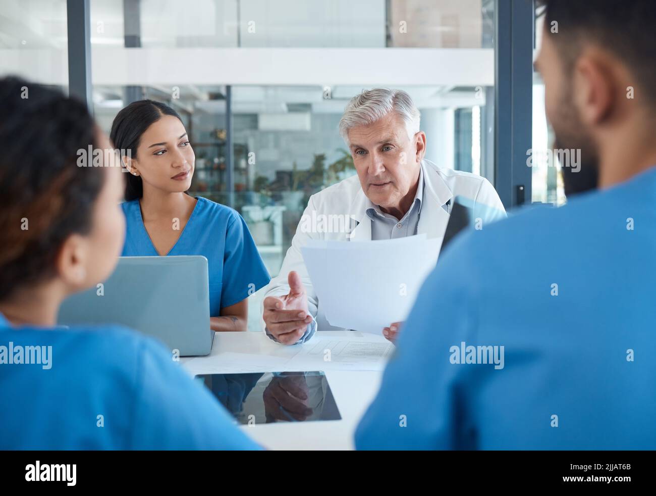 The best team we could have assembled. a group of medical staff having a meeting. Stock Photo