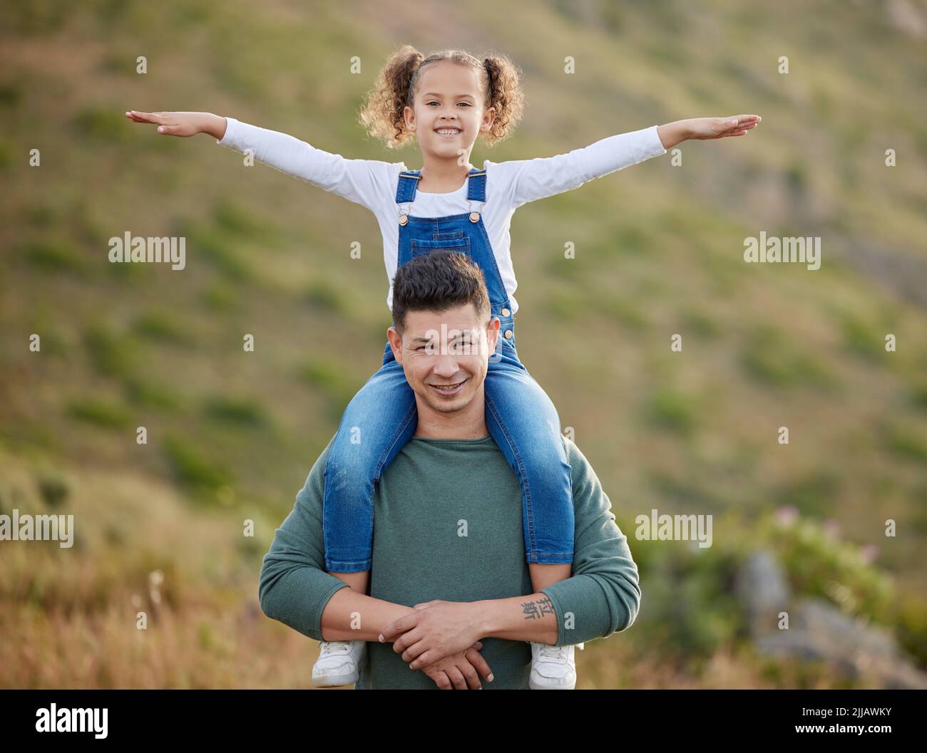 The day I became a father was the best day of my life. an adorable little girl spending the day outdoors with her father. Stock Photo