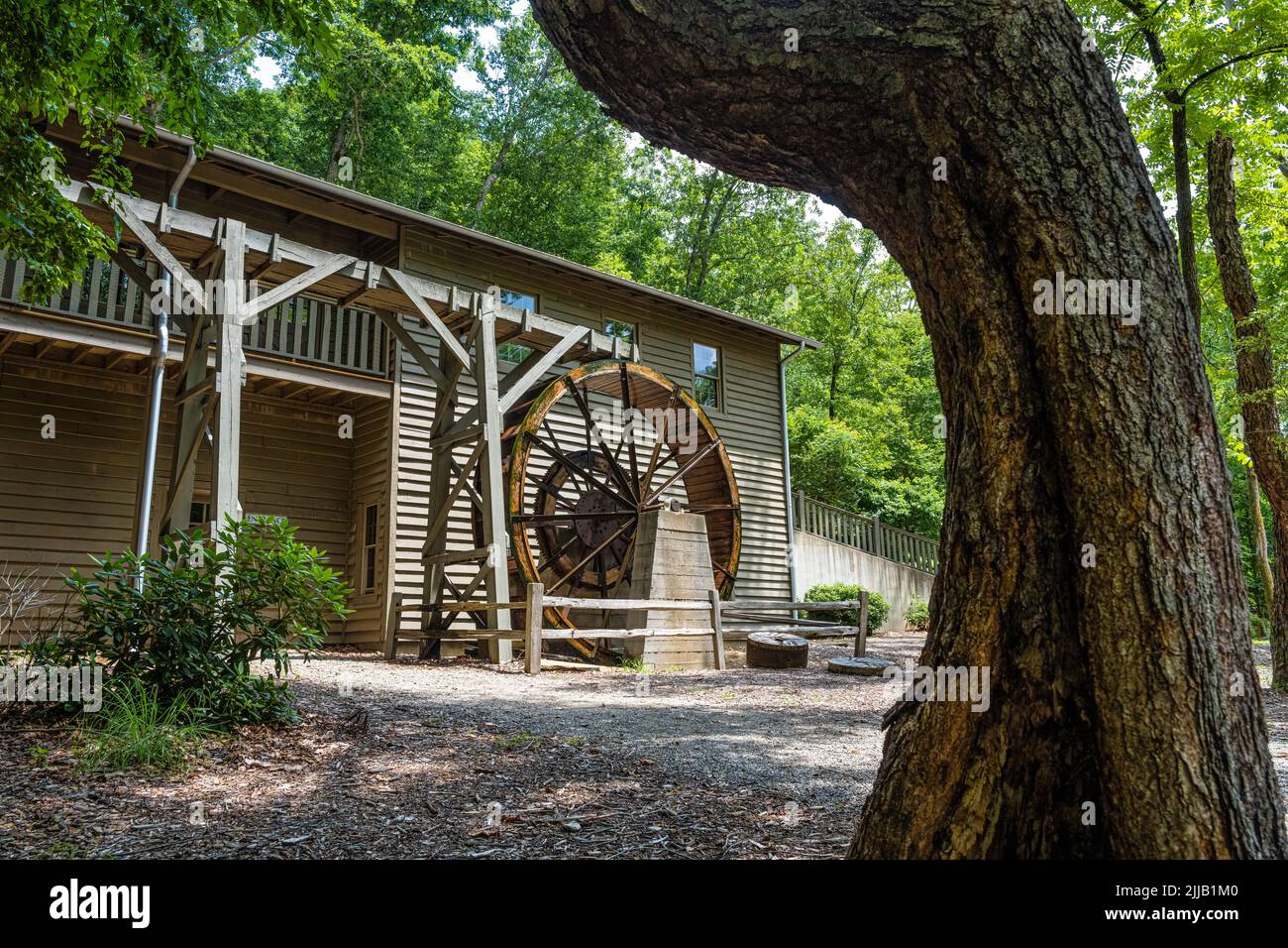 Restored grist mill and waterwheel at Meeks Park in Blairsville, a scenic town in Georgia's Blue Ridge Mountains. (USA) Stock Photo