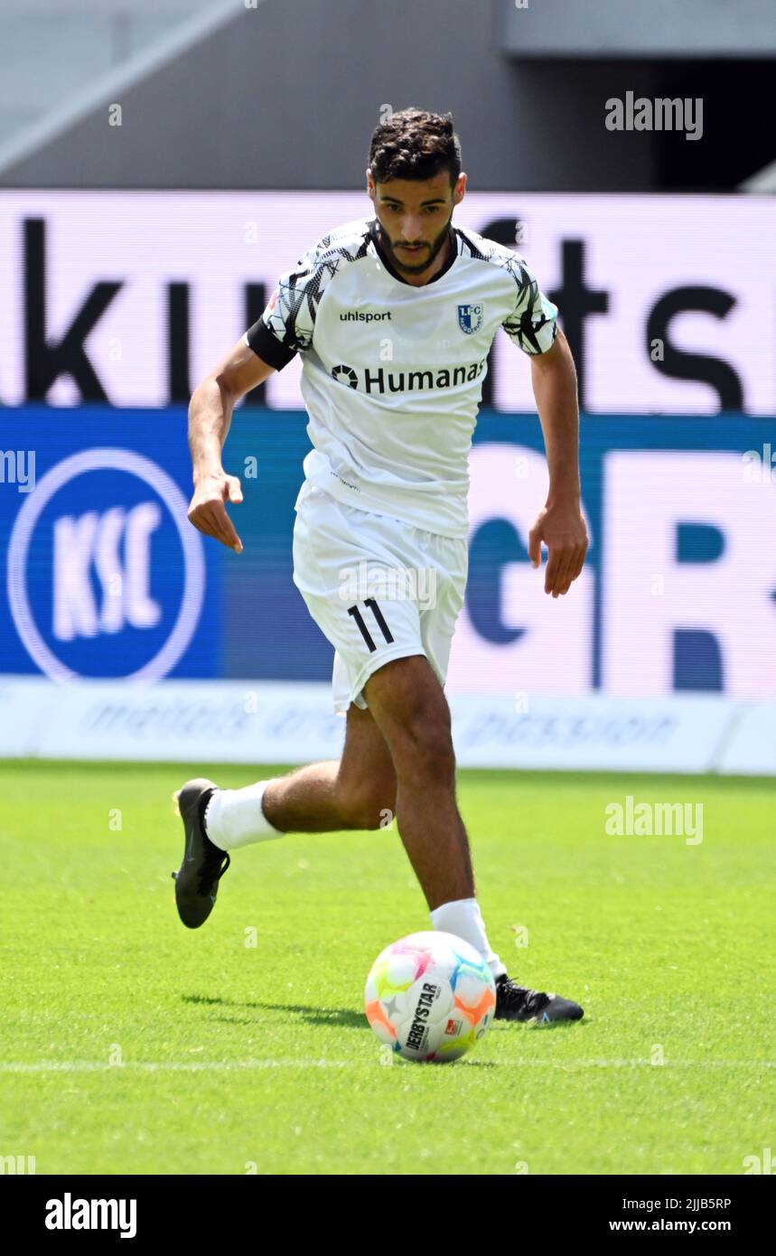 Karlsruhe, Germany. 24th July, 2022. Soccer: 2nd Bundesliga, Karlsruher SC - 1. FC Magdeburg, Matchday 2, at BBBank Wildpark. Magdeburg's Mohammed El Hankouri- Credit: Uli Deck/dpa - IMPORTANT NOTE: In accordance with the requirements of the DFL Deutsche Fußball Liga and the DFB Deutscher Fußball-Bund, it is prohibited to use or have used photographs taken in the stadium and/or of the match in the form of sequence pictures and/or video-like photo series./dpa/Alamy Live News Stock Photo