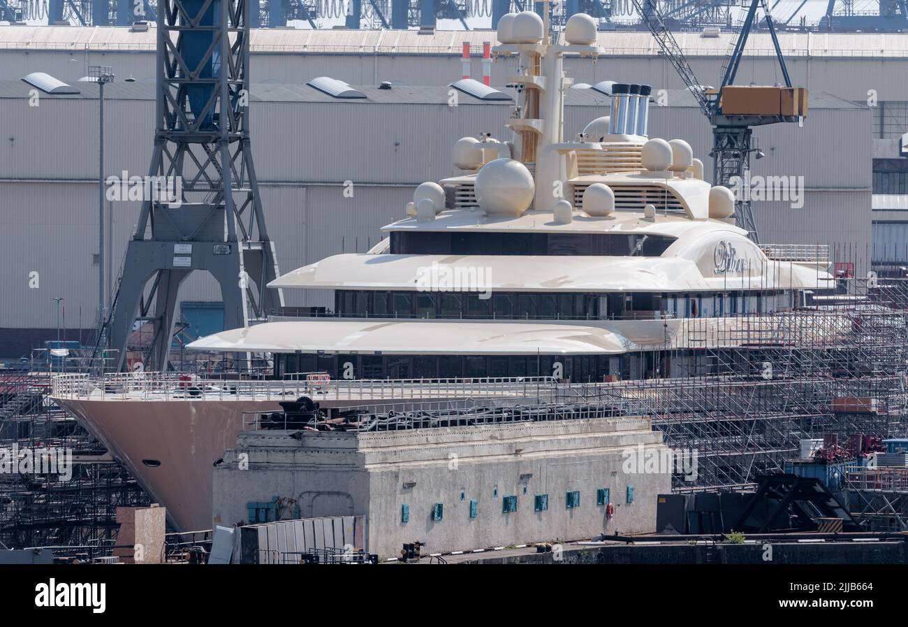 Hamburg, Germany. 24th July, 2022. The mega-yacht Dilbar is moored at Blohm Voss Dock Elbe 17 in the Port of Hamburg . The ship, which is around 156 meters long, is said to belong to a Russian oligarch. Credit: Markus Scholz/dpa/Alamy Live News Stock Photo