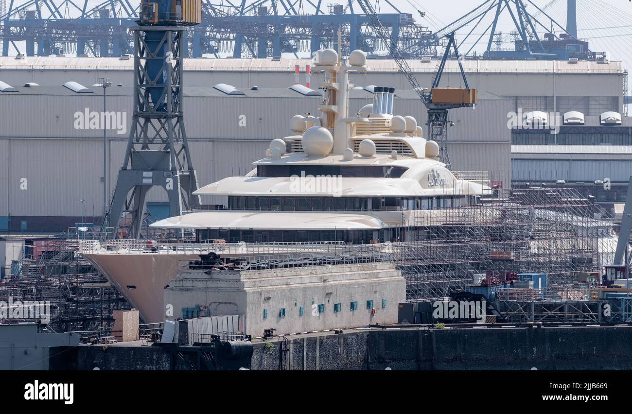 Hamburg, Germany. 24th July, 2022. The mega-yacht Dilbar is moored at Blohm Voss Dock Elbe 17 in the Port of Hamburg . The ship, which is around 156 meters long, is said to belong to a Russian oligarch. Credit: Markus Scholz/dpa/Alamy Live News Stock Photo