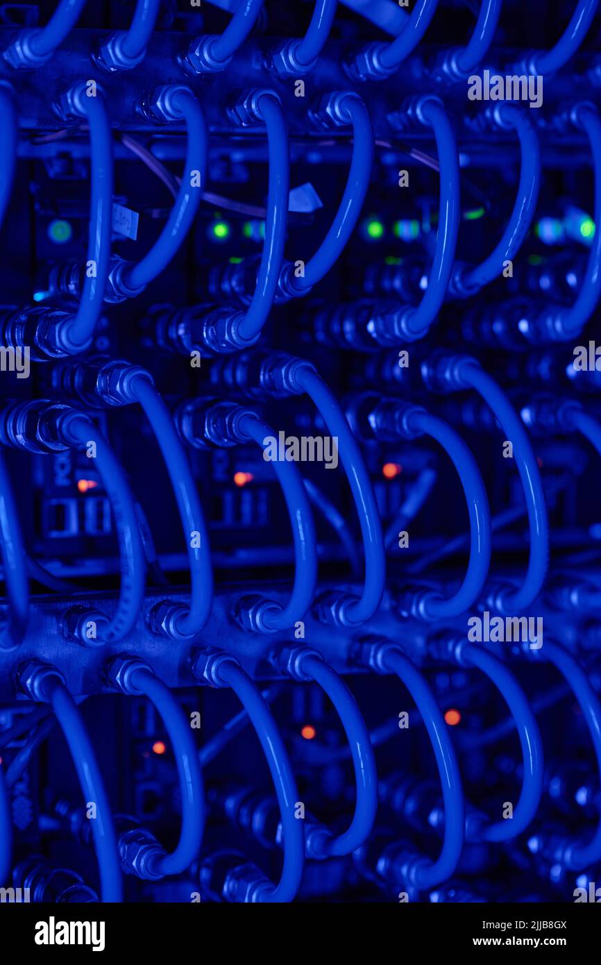 Network device front panel with cables connected in data center room