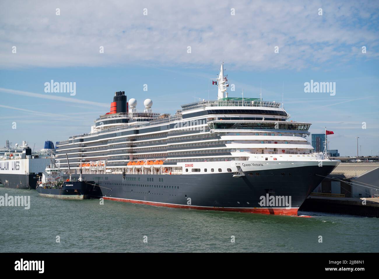 The MS Queen Victoria, a Vista-class cruise ship operated by Cunard, docked in Southampton Docks harbourside. Stock Photo