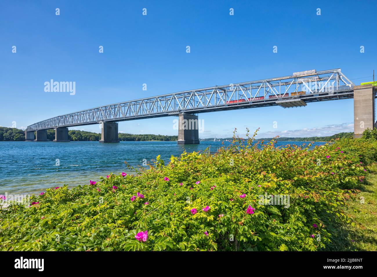 Old, combined road and railway bridge crossing the little Belt at Middelfart, Denmark Stock Photo