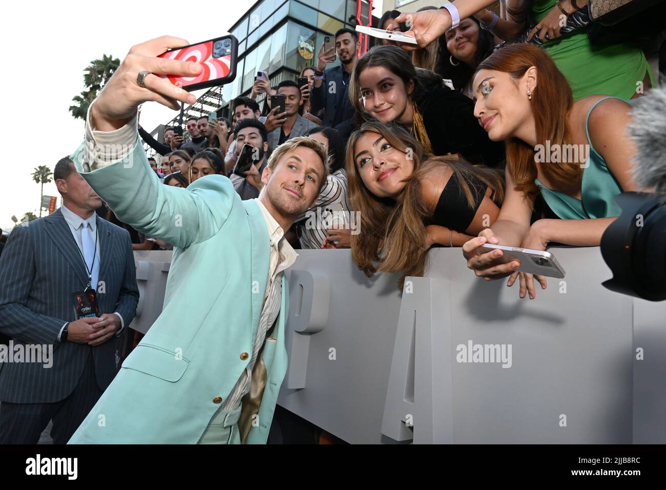 Undated film still handout from The Gray Man. Pictured: Ryan Gosling (L) attends Netflix's 'The Gray Man' Los Angeles Premiere at TCL Chinese Theatre on July 13, 2022 in Hollywood, California. Picture credit should read: PA Photo/Michael Kovac/Getty Images for Netflix. All Rights Reserved. WARNING: This picture must only be used to accompany PA Feature SHOWBIZ Film The Gray Man. Stock Photo