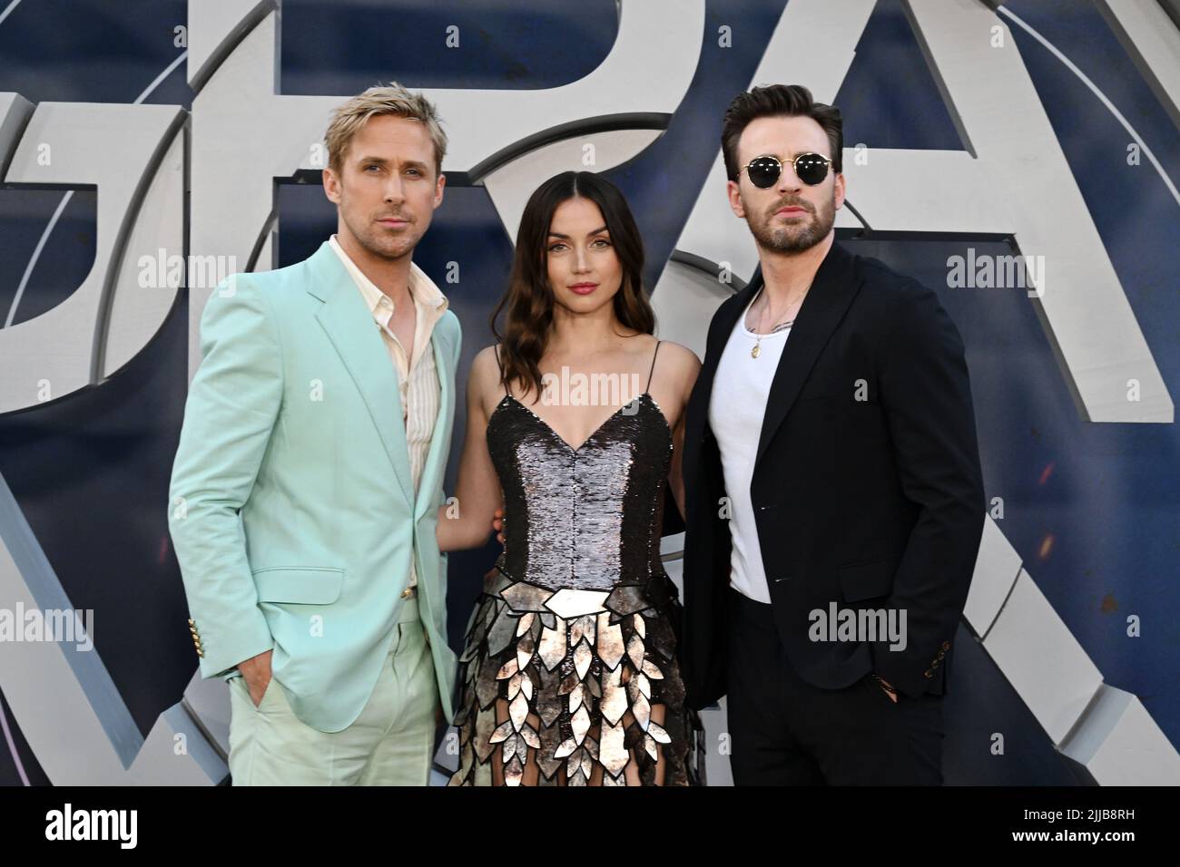 Undated film still handout from The Gray Man. Pictured: (L-R) Ana de Armas, Ryan Gosling, and Chris Evans attend Netflix's 'The Gray Man' Los Angeles Premiere at TCL Chinese Theatre on July 13, 2022 in Hollywood, California. Picture credit should read: PA Photo/Michael Kovac/Getty Images for Netflix. All Rights Reserved. WARNING: This picture must only be used to accompany PA Feature SHOWBIZ Film The Gray Man. Stock Photo