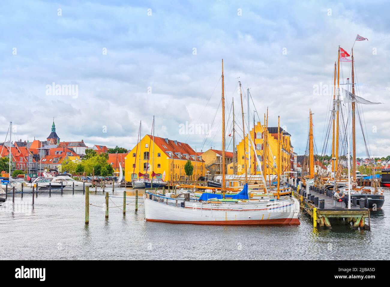 Cityscape with marina and pier for historic sail boats at Svendborg, Denmark Stock Photo