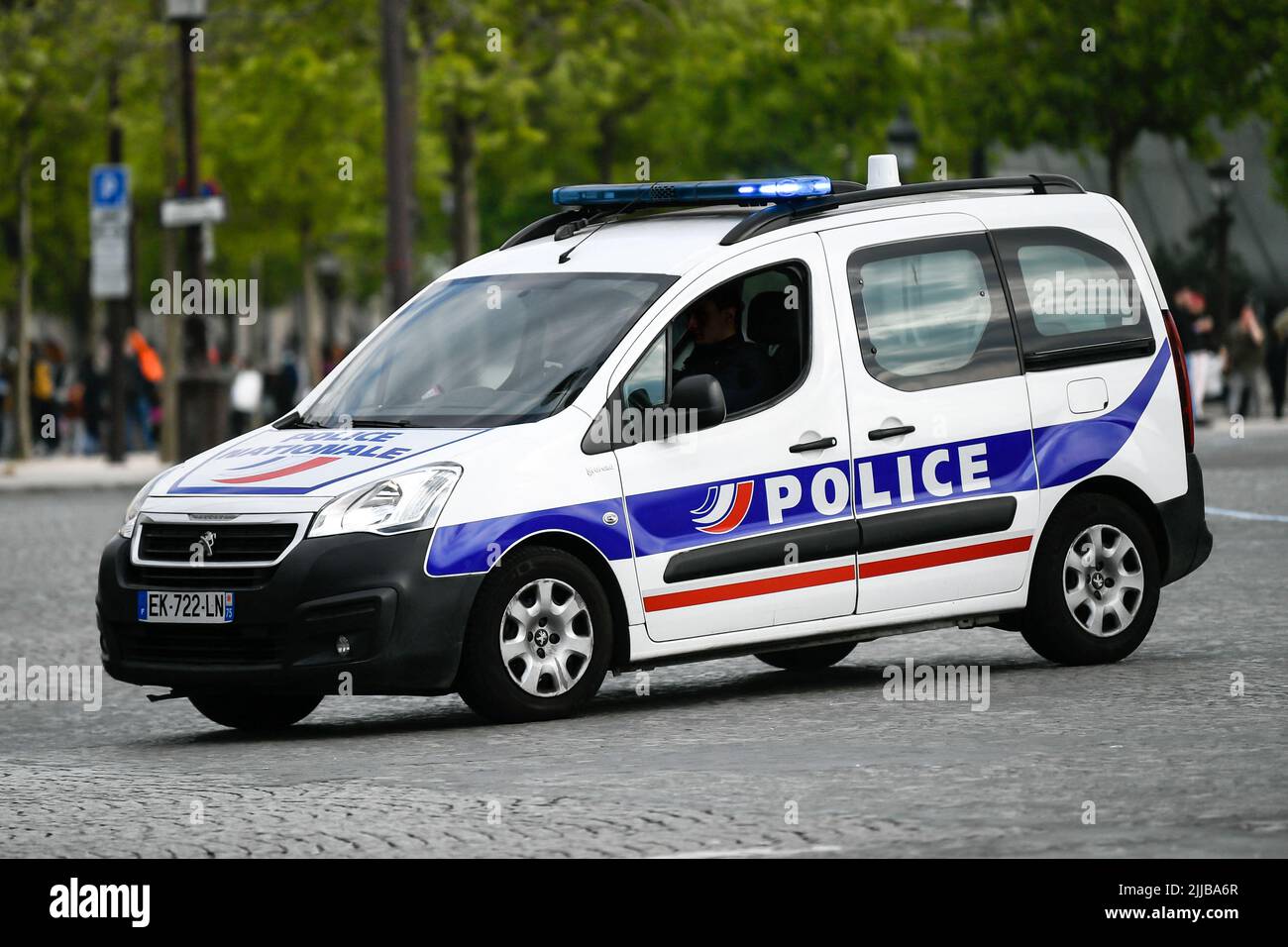 A police car (truck, van) drives through the city ensuring security in  Paris, France on July 24, 2022. French national police in action. Photo by  Victor Joly/ABACAPRESS.COM Stock Photo - Alamy
