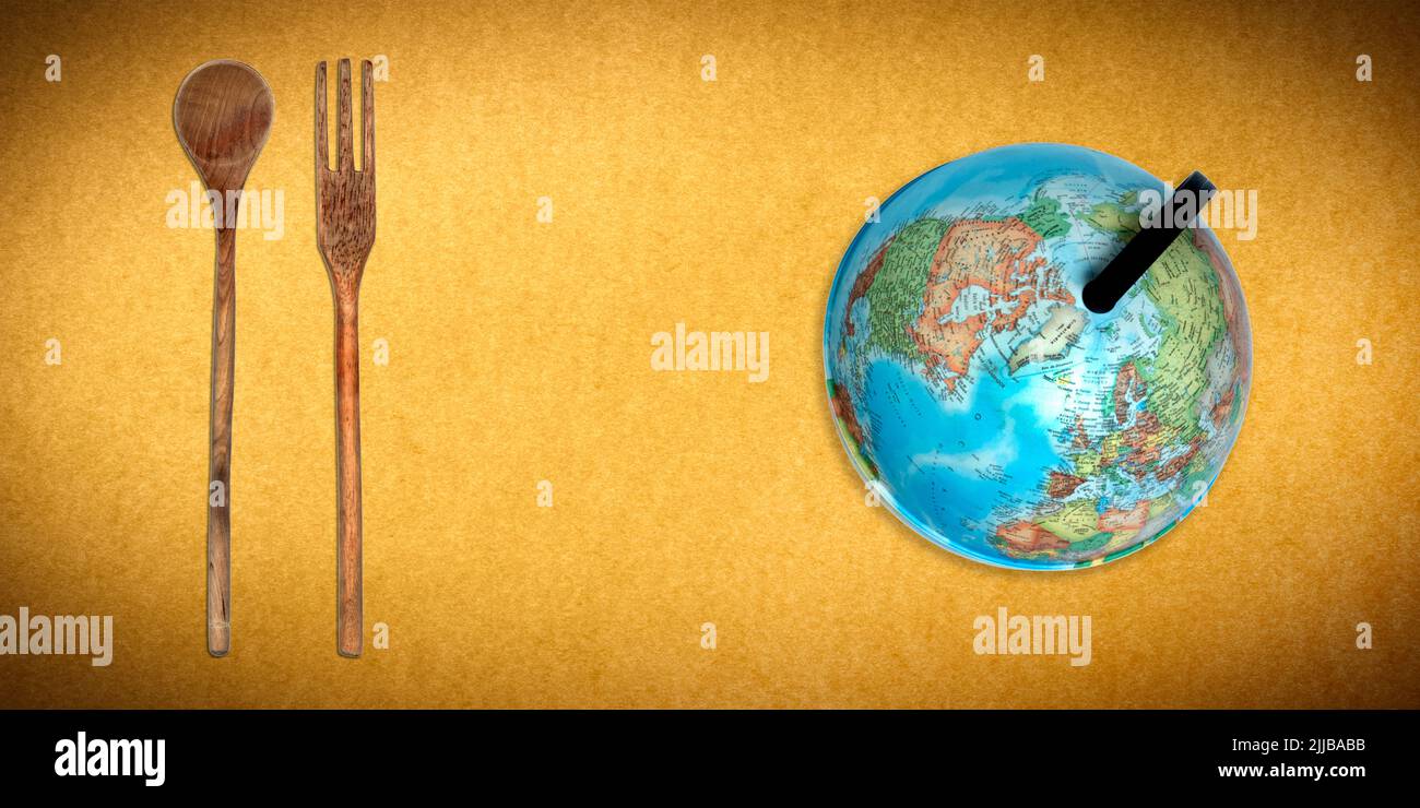 Topview of Set Cooking Wooden Utensils and World Globe on Yellow