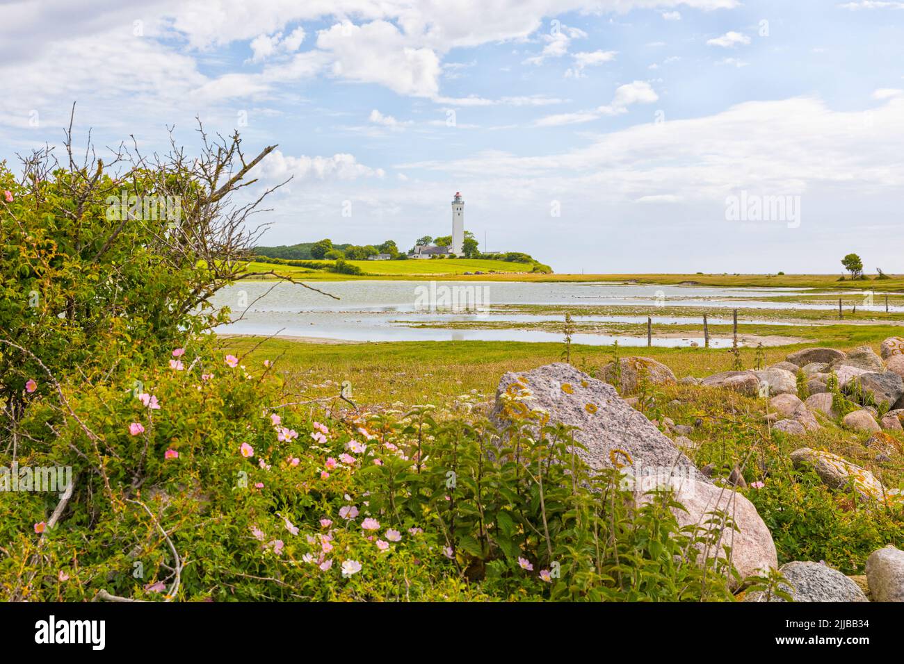 Keldsnor lake and lighthouse in the south of Baltic Sea island of Langeland, Denmark Stock Photo