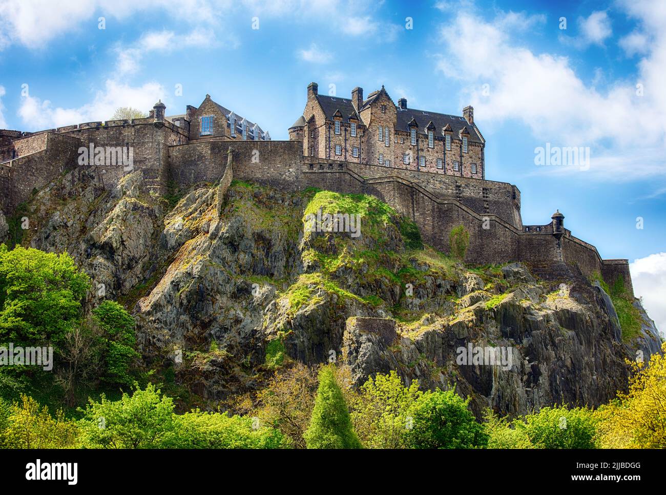 Castle hill in Edinburgh with green grass and blue sky, Scotland, UK Stock Photo