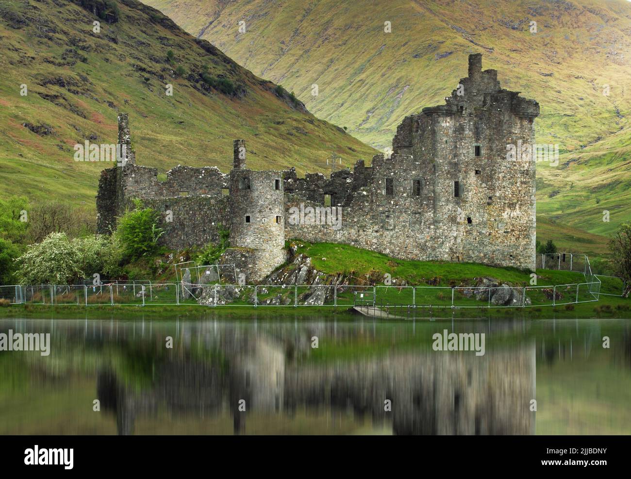 Kilchurn Castle with reflection in water - Scotland, UK Stock Photo