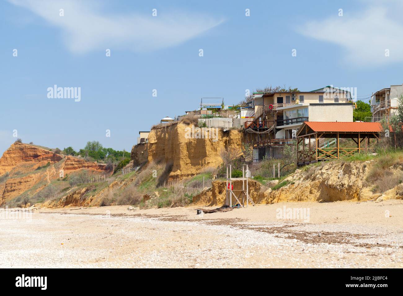Lyubimovka beach coastal view with guest houses for rent. Summer landscape, Black Sea coast, Crimea Stock Photo