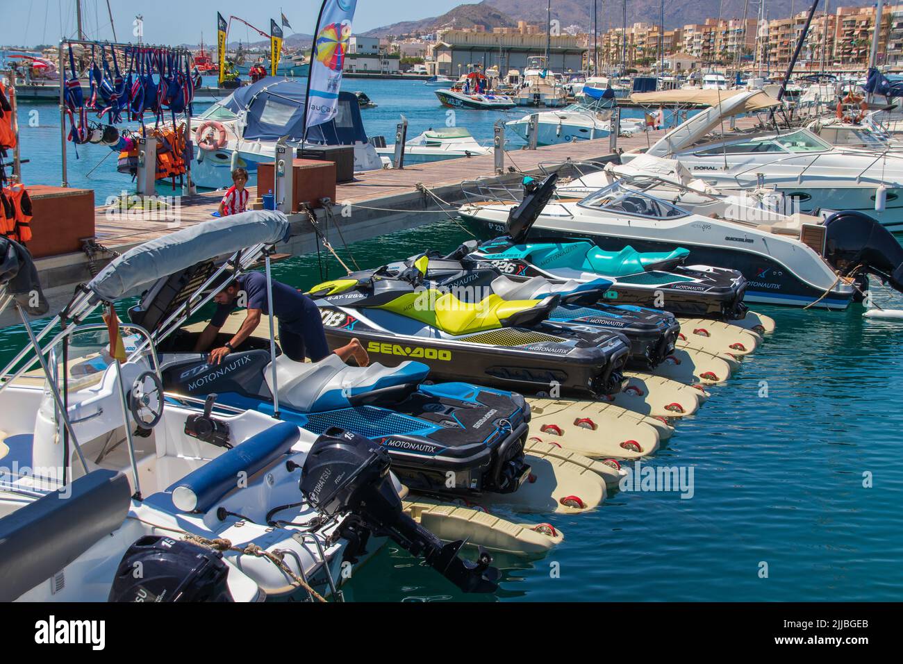 Boat, Jet Ski For Hire on the Marina at Garrucha, Almeria province, Andalucía Spain Stock Photo
