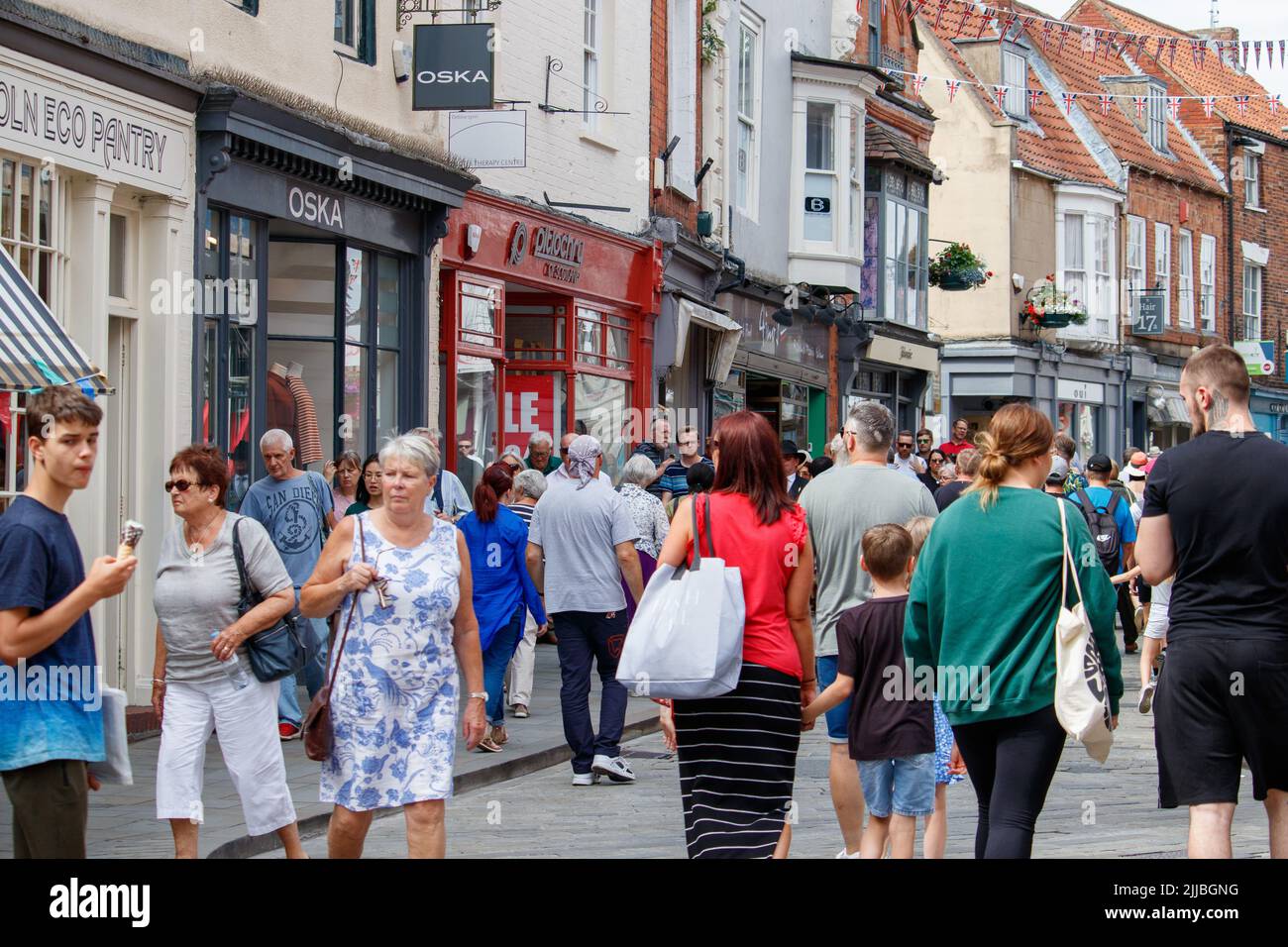A busy Batlgate shopping scene in uphill Lincoln taken on a Saturday afternoon in the summer. Stock Photo