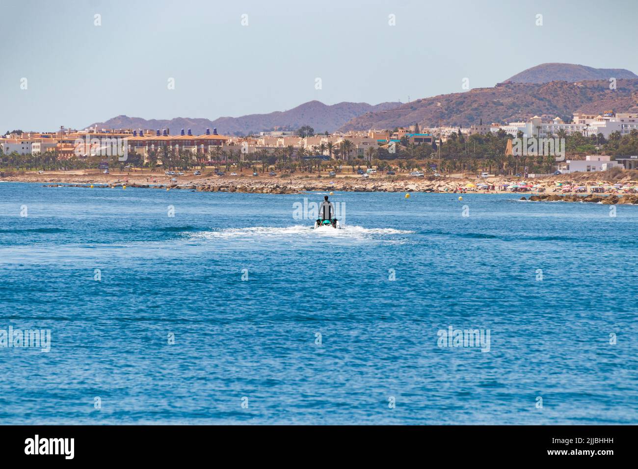Lone Jet Skier on the Mediterranean sea at Garrucha Almeria province, Andalucía, Spain Stock Photo