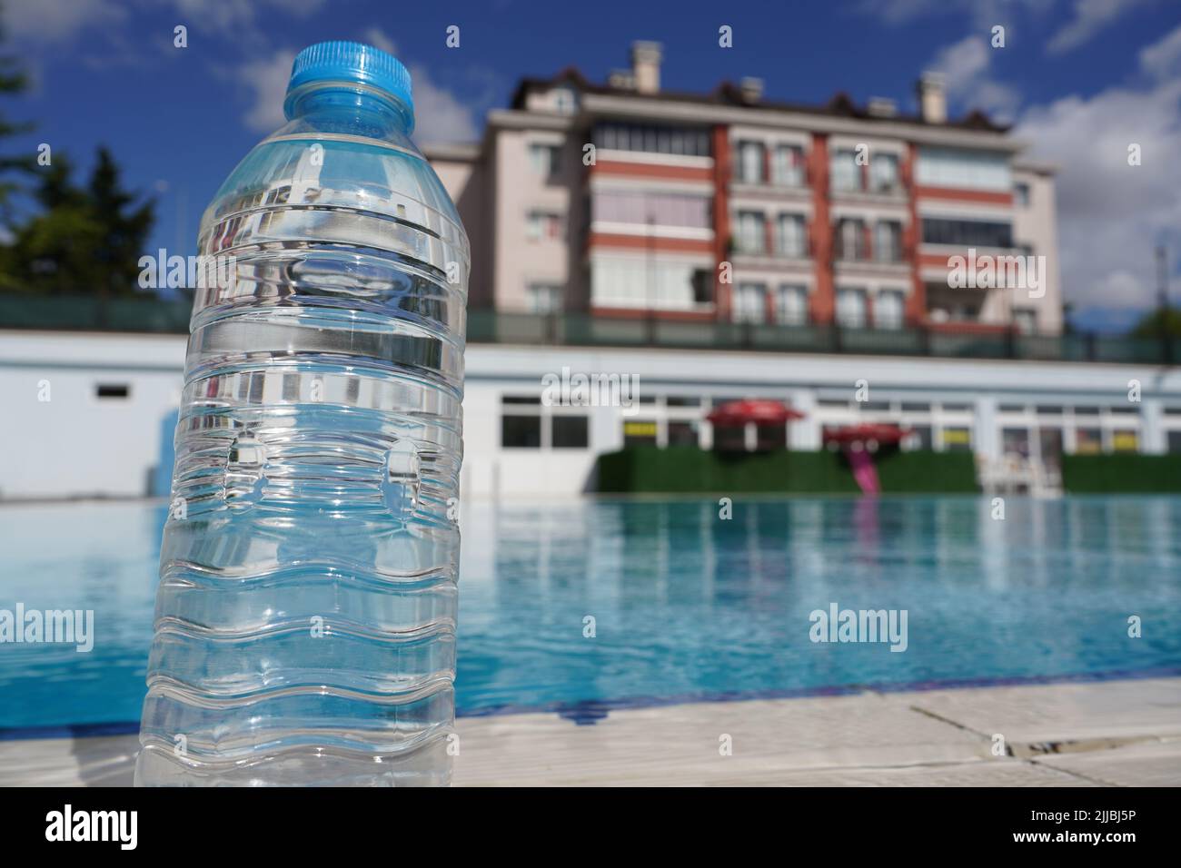 Bottle of cold water with drops isolated on white background Stock Photo -  Alamy