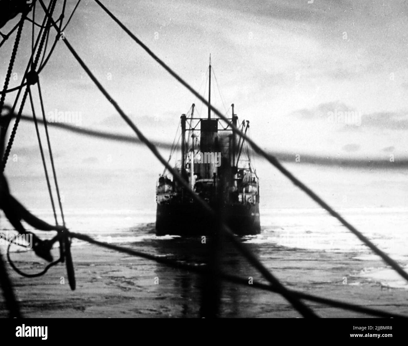 The Larson towing the City of New York through the ice pack, Byrd Antarctic Expedition Stock Photo