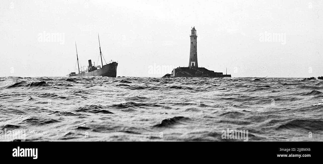 SS Blue Jacket on the rocks, Longships Lighthouse off Lands End, Cornwall in 1898 Stock Photo