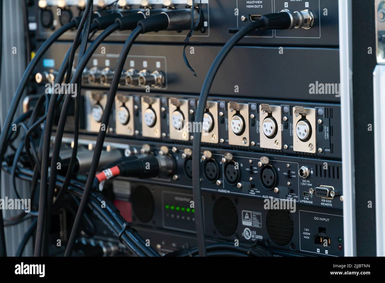 Close up audio snake and stage box with xlr cables and jacks at a live