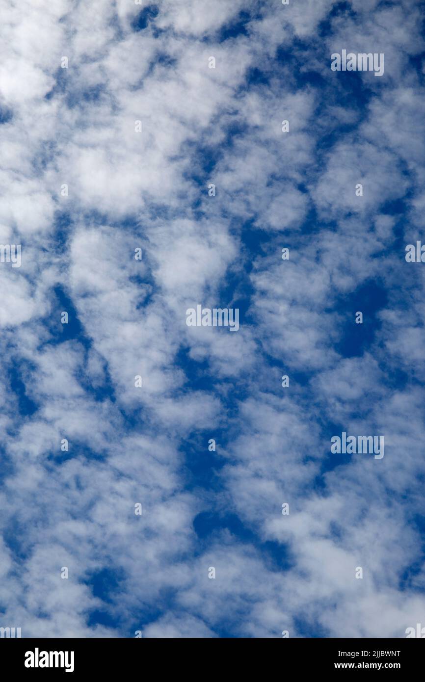 Altocumulus Castellanus Fair Weather Clouds in Blue Sky Stock Photo