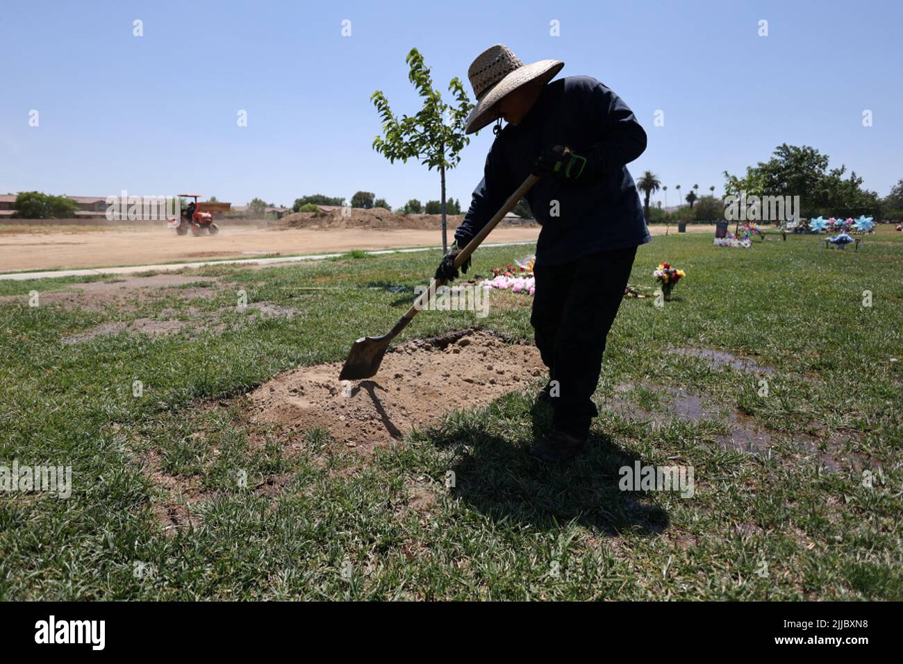The grave of Gerardo Avila is seen at Perris Valley Cemetery in Perris, California, U.S., July 12, 2022. REUTERS/Lucy Nicholson Stock Photo