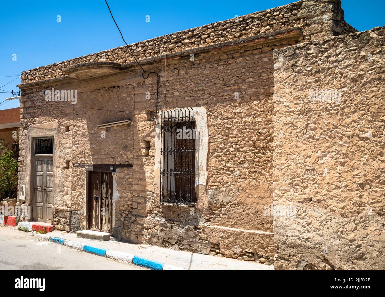 The entrance to an ancient traditional house in El Jem, Tunisia. El Jem