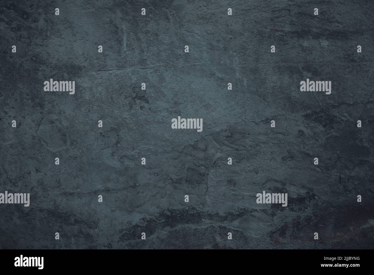 Gloomy black granite stone surface texture background Stock Photo