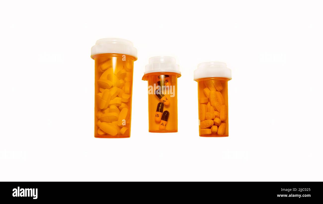 Three pill bottles isolated on a white background with clipping path