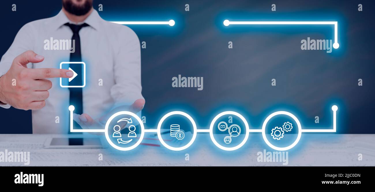 Businessman With A Pad And Pointing On Play Button And Digital Symbols ...