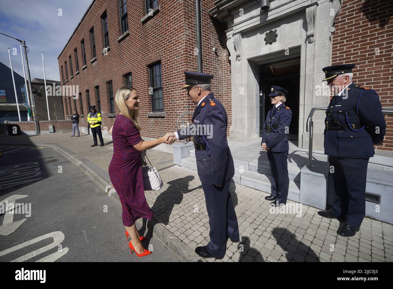 Minister for Justice Helen McEntee shakes hands with Garda commissioner Drew Harris during a ceremony to mark the opening of the garda station in Athlone, County Westmeath. Picture date: Monday July 25, 2022. Stock Photo