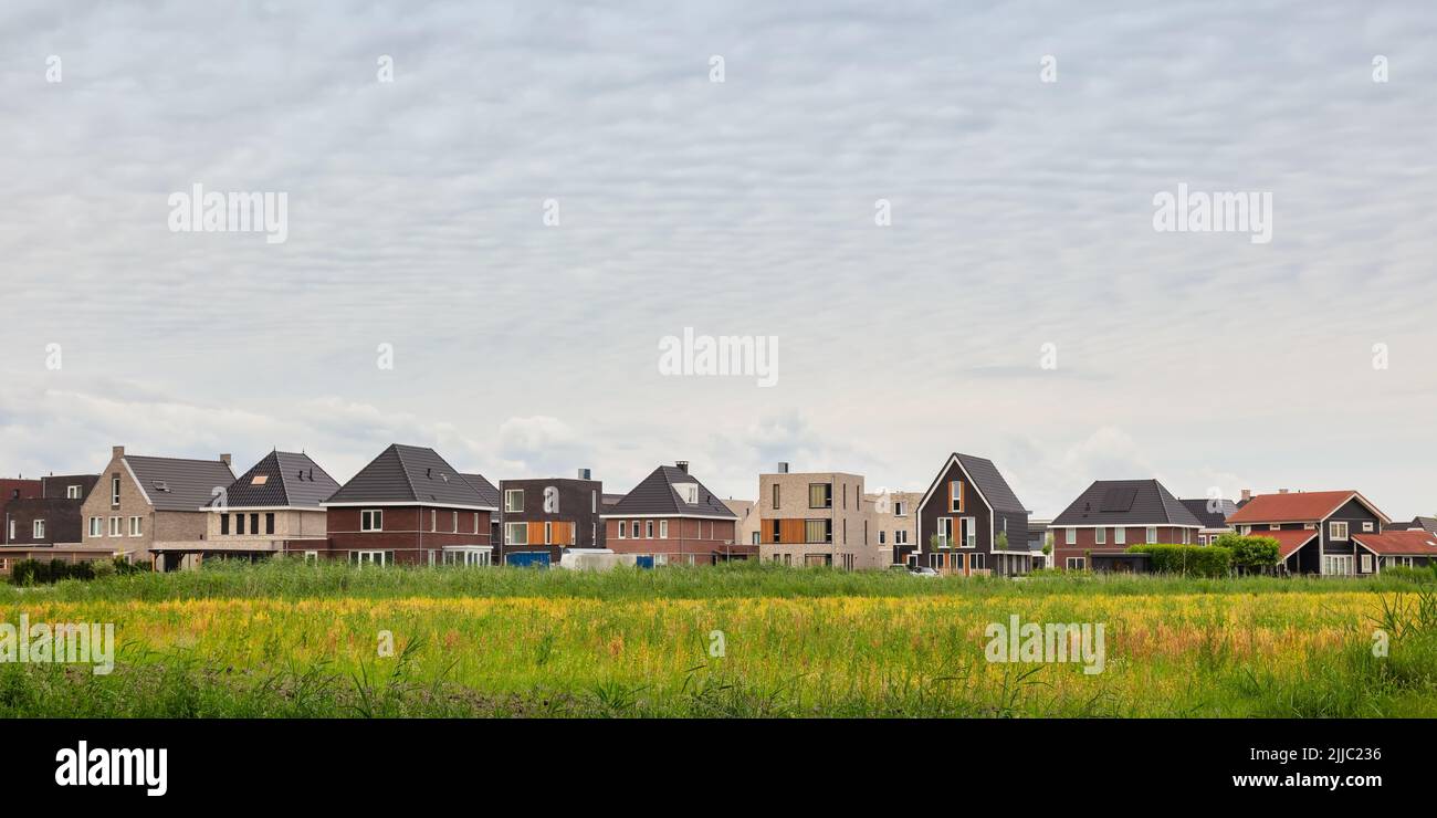 New detached Dutch family houses on a vinex location in Almere Oosterwold, The Netherlands Stock Photo