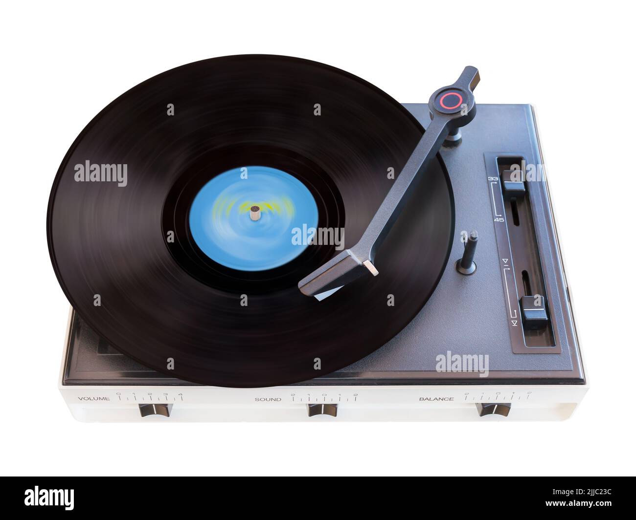 Vintage turntable with spinning record isolated on a white background Stock Photo