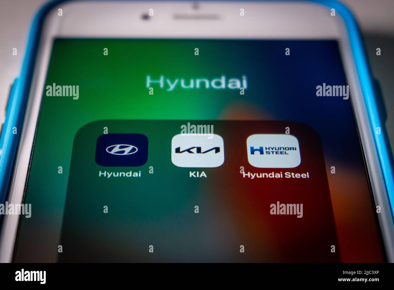 Kumamoto, JAPAN - Jul 17 2022 : Korean conglomerate Hyundai Group (Hyundai Motor Company, KIA Corporation & Hyundai Steel) on iPhone in dark mood Stock Photo