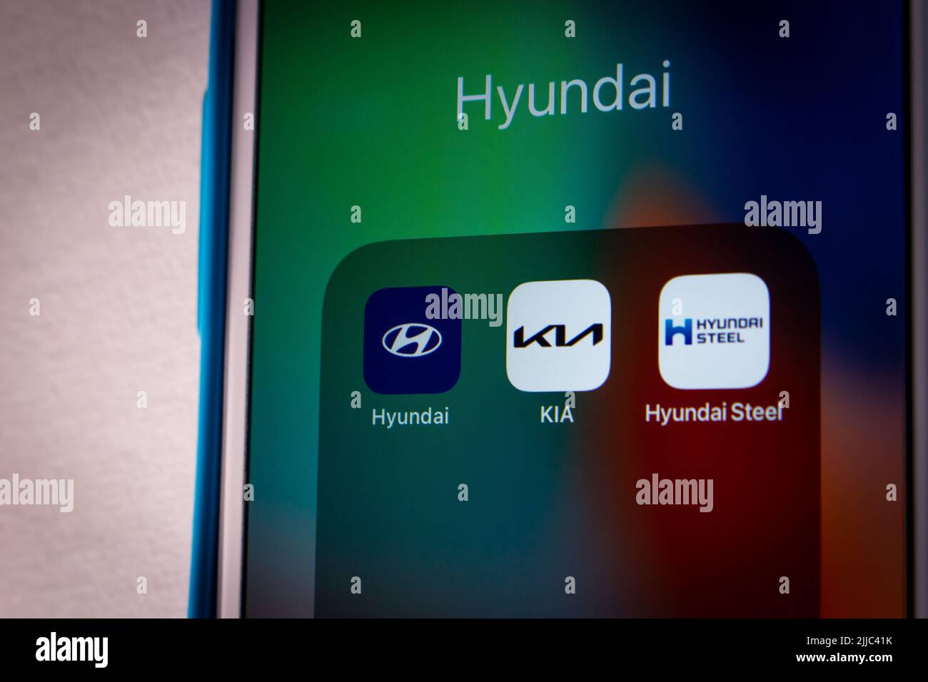 Kumamoto, JAPAN - Jul 17 2022 : Hyundai Group icons (Hyundai Motor Company, KIA Corporation and Hyundai Steel) on an iPhone in a dark mood. South Kore Stock Photo