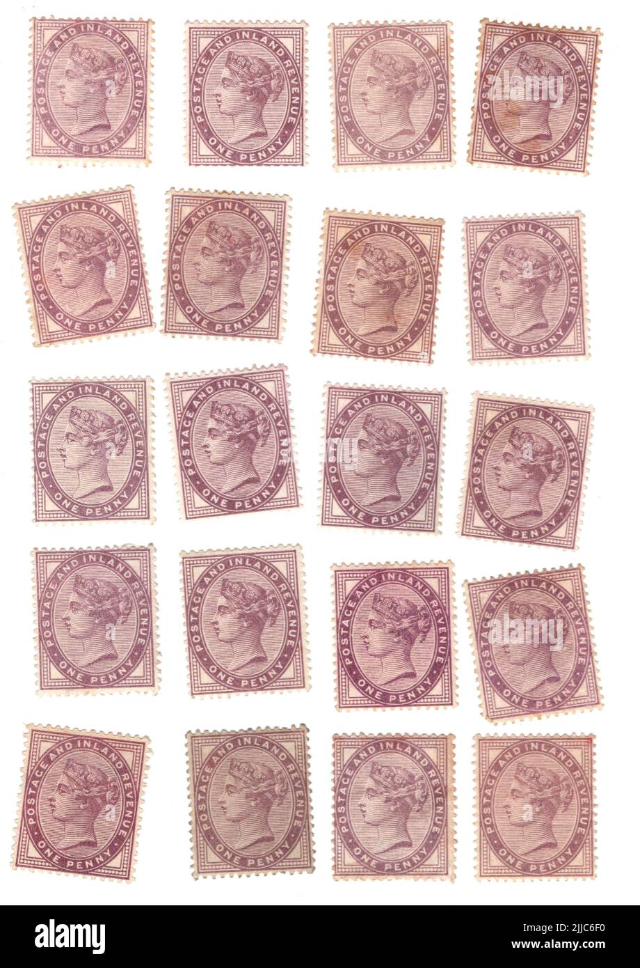 A selection of Victorian one penny lilac mint GB postage stamps on a
