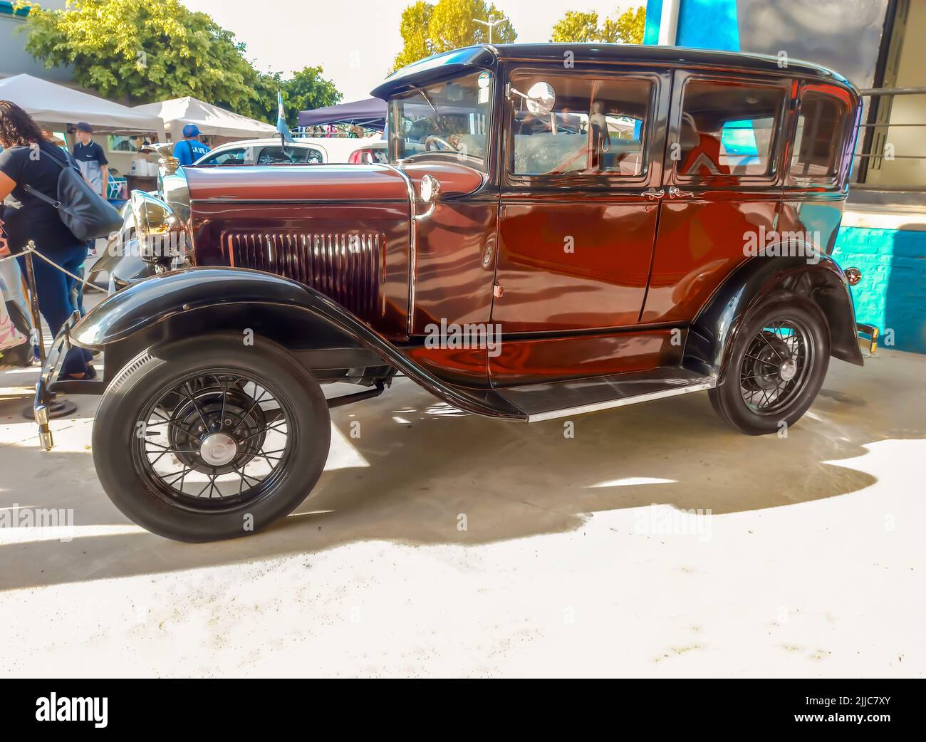Old red Ford Model A Tudor hatchback sedan 1928 - 1931. Expo Fierro 2022 classic car show. Copyspace Stock Photo