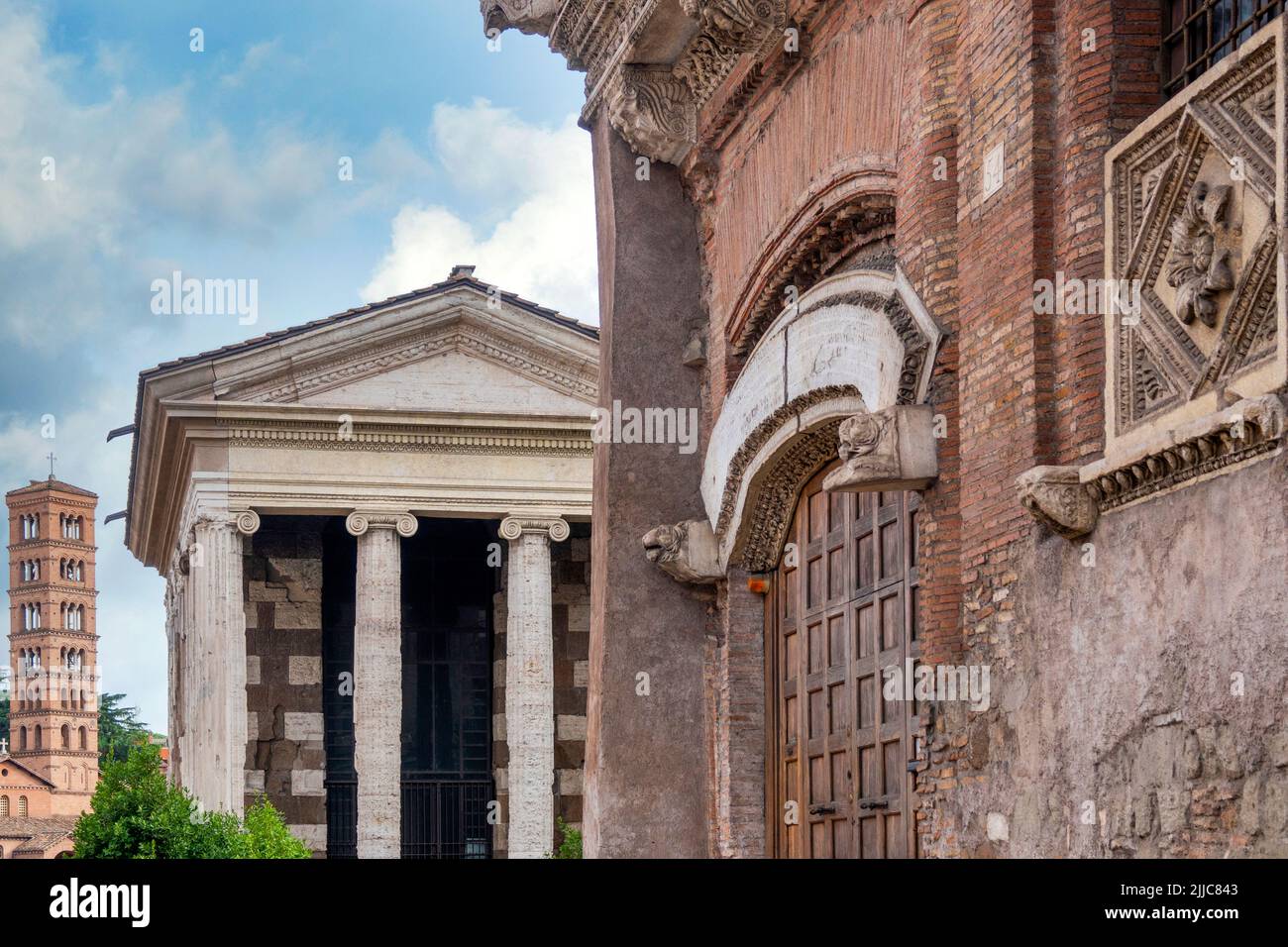 Casa dei Crescenzi, Temple of Portunus and the belltwer of Santa Maria in Cosmedin in the Forum Boarium, Rome, Italy Stock Photo
