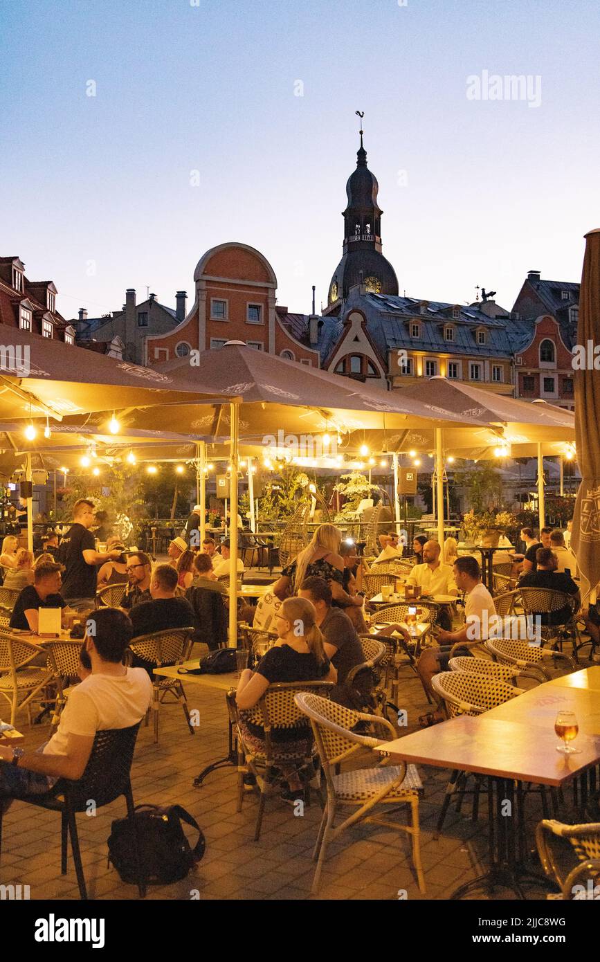 Riga bar; people drinking in bars and cafes at night, Riga Old Town, Riga Latvia Europe Stock Photo