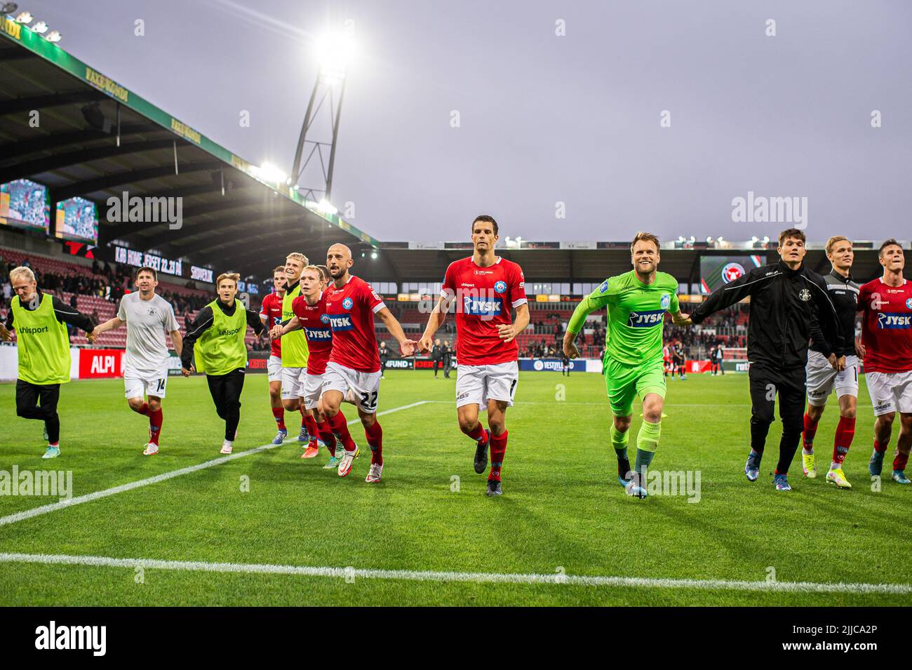 Herning, Denmark. 22nd, July 2022. The players of Silkeborg IF are celebrating the victory after the 3F Superliga match between FC Midtjylland and Silkeborg IF at MCH Arena in Herning. (Photo credit: Gonzales Photo - Morten Kjaer). Stock Photo