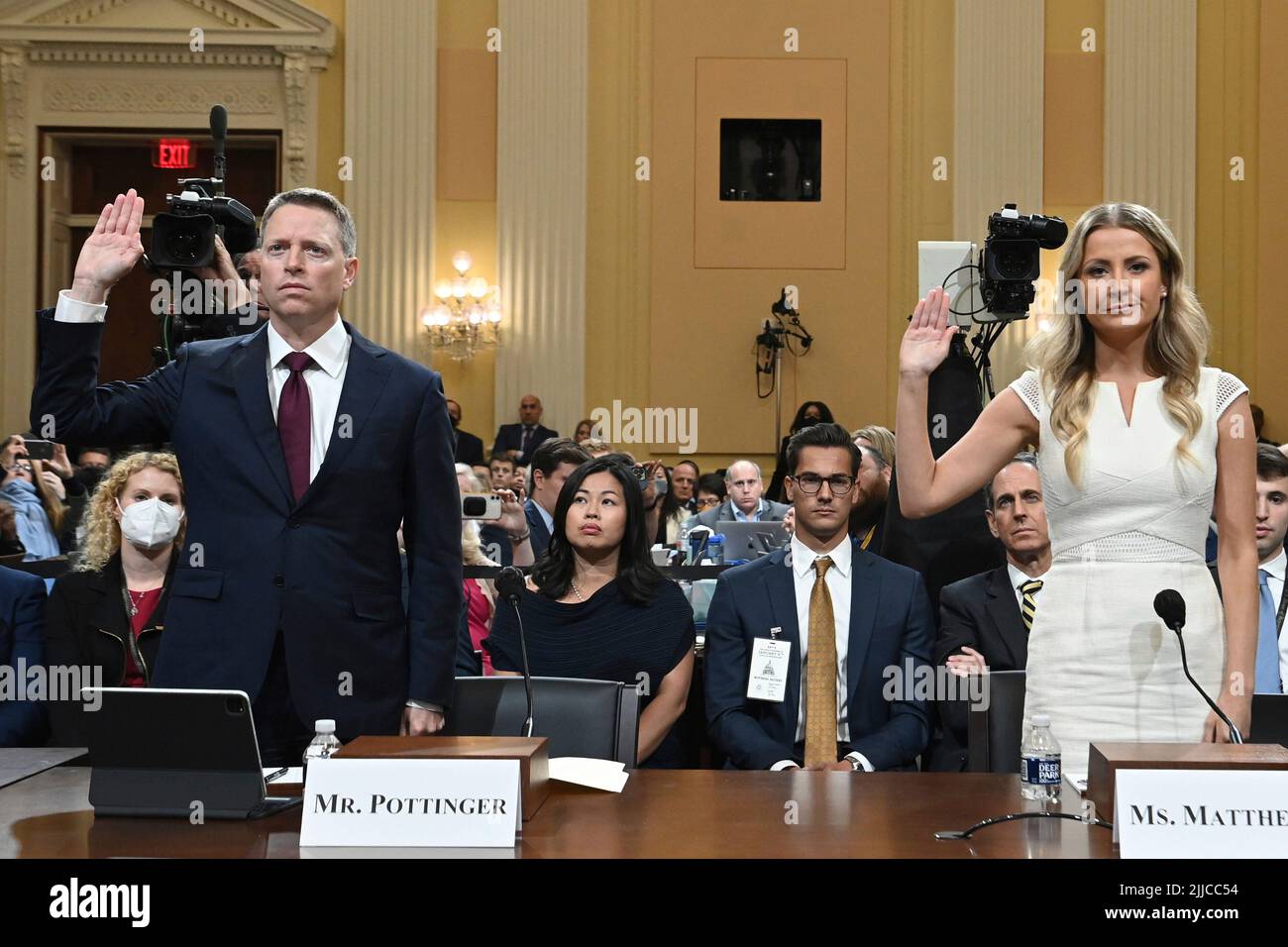 Former National Security Council member Matthew Pottinger (L) and