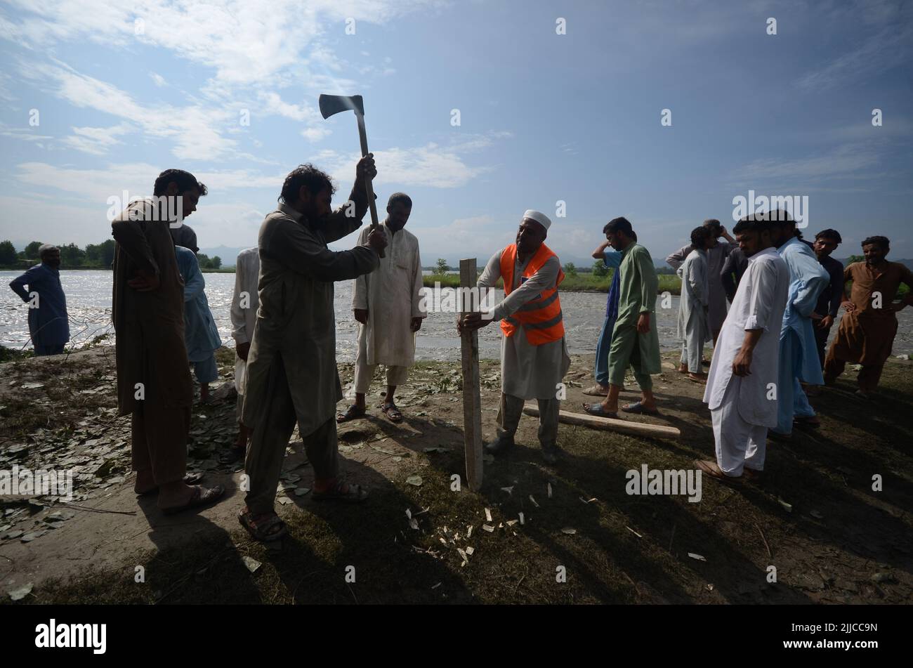 Peshawar, Khyber Pakhtunkhwa, Pakistan: July 24, 2022,  Flood in Mathura Shagai Hindkian Wazir Qila area of Peshawar since seven o'clock in the morning. Safety dams were to be built at several places under the Act, but due to the continuous increase in floods, the safety dams at three places have also been washed away. The administration has already opened the spills of Varsik Dam, while on the other hand, in Afghanistan and tribal areas. Due to continuous rain since last year, the water has diverted to the mentioned areas for which emergency measures are required. (Credit Image: © Hussain Al Stock Photo
