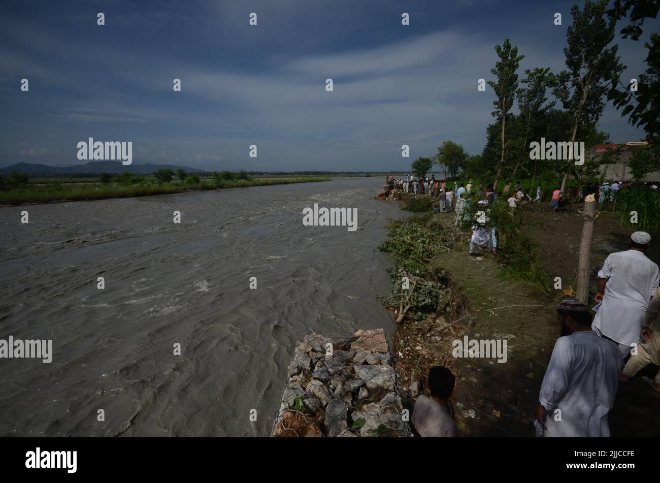 Peshawar, Khyber Pakhtunkhwa, Pakistan: July 24, 2022,  Flood in Mathura Shagai Hindkian Wazir Qila area of Peshawar since seven o'clock in the morning. Safety dams were to be built at several places under the Act, but due to the continuous increase in floods, the safety dams at three places have also been washed away. The administration has already opened the spills of Varsik Dam, while on the other hand, in Afghanistan and tribal areas. Due to continuous rain since last year, the water has diverted to the mentioned areas for which emergency measures are required. (Credit Image: © Hussain Al Stock Photo