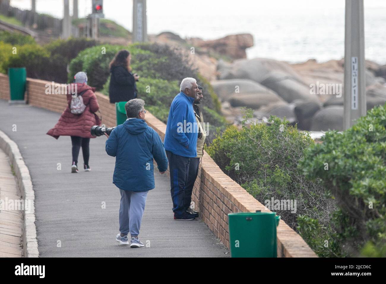 (220725) -- CAPE TOWN, July 25, 2022 (Xinhua) -- People watch whales in Cape Town, South Africa on July 13, 2022.  TO GO WITH 'Feature: Passion for whales takes Cape Town residents to citizen science' (Xinhua/Lyu Tianran) Stock Photo