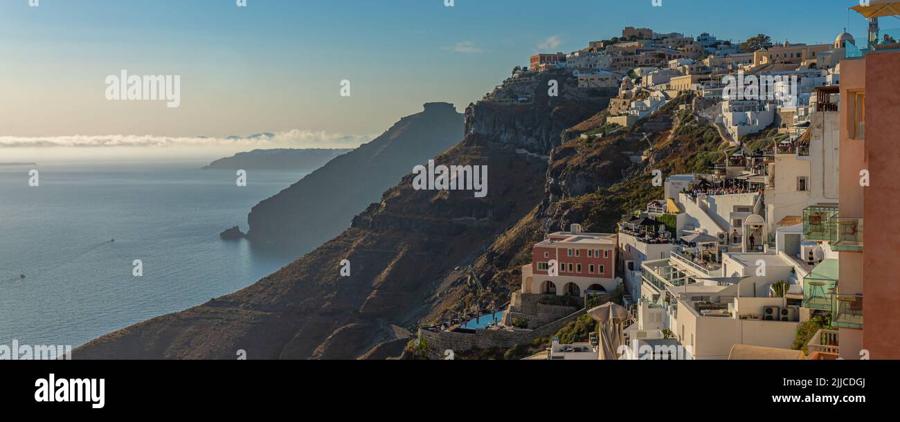 FIRA, GREECE - MAY 21.2022: Landscape at Fira with the sea on Santorini island in Greece, panorama Stock Photo