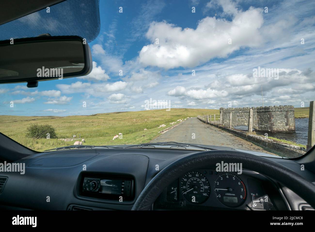 View of the road from a car window on Denbighsire moors North Wales Stock Photo