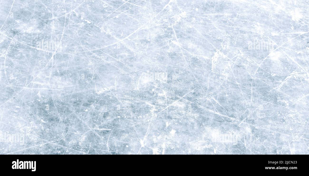 Natural scratched ice at the ice rink as texture or background for winter composition, large long picture Stock Photo