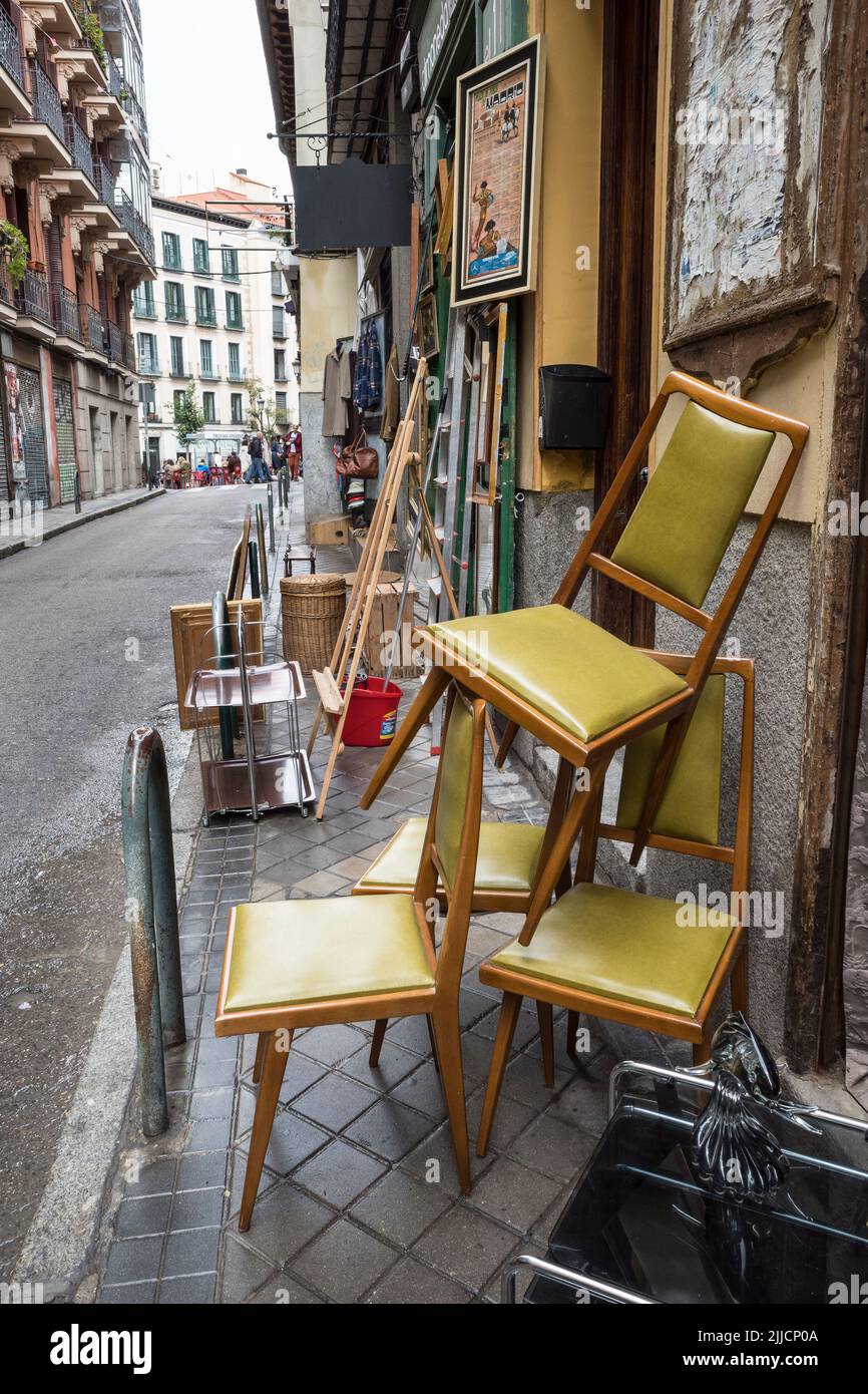 Old Furniture on sale in the Rastro flea market around the Plaza de Cascorro between La Latina and Embajadores,  Madrid, Spain. Stock Photo